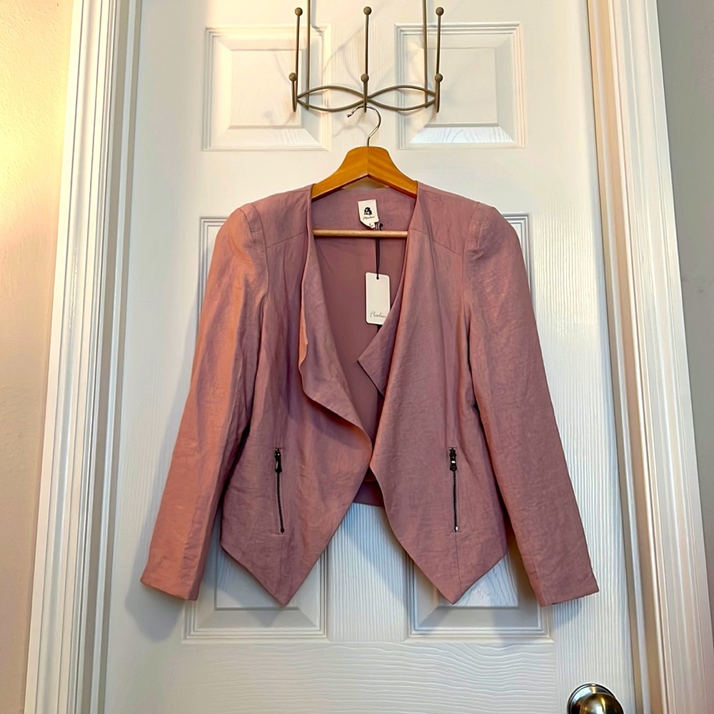 Size small pink blazer.